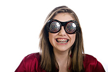 Teenager Girl With Braces And X-ray Glasses