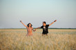 © photographmd - Young couple in wheat field