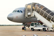 Airplane loading on tarmac at Siem Reap International Airport