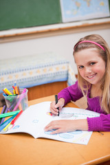 Poster - Portrait of a schoolgirl drawing