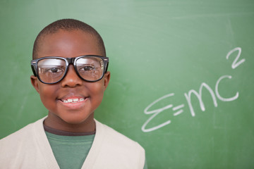 Poster - Schoolboy posing with the the mass-energy equivalence formula