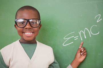 Poster - Schoolboy showing the the mass-energy equivalence formula
