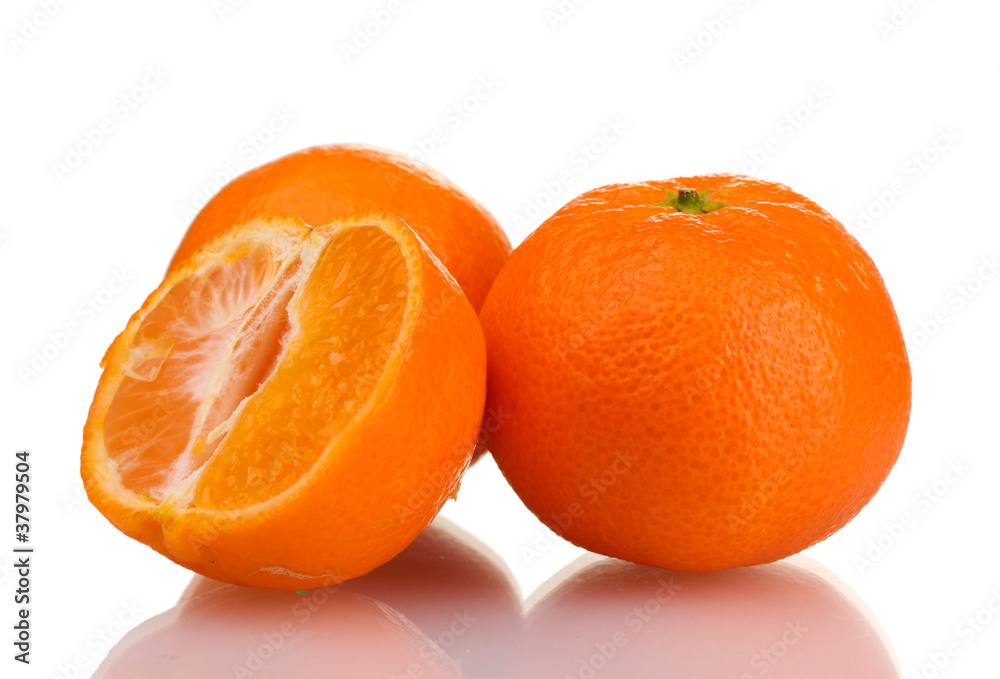 Ripe tasty tangerines with leaves and segments isolated on white
