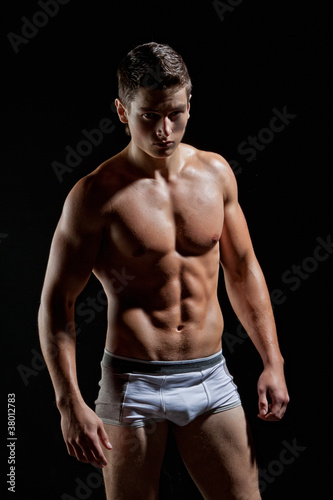 Obraz na plátně Muscular young naked sexy boy posing in underwear
