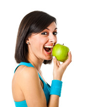 Healthy Lifestyle - Fitness Woman Eating Apple