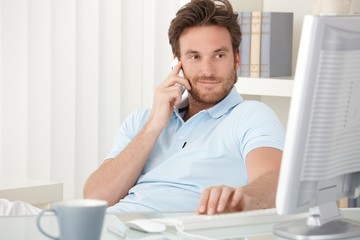 Sticker - Portrait of smiling man speaking on phone