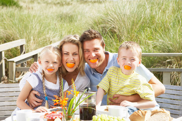 Wall Mural - Family on vacation eating outdoors