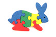 Colorful wooden rabbit puzzle toy on white background