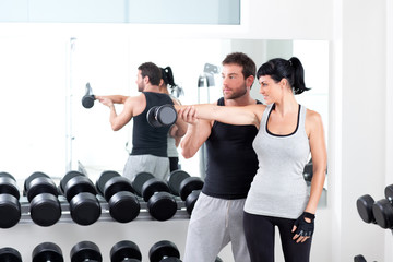 Wall Mural - gym woman personal trainer with weight training