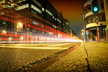 Wall Mural - Urban city road with car light trails at night