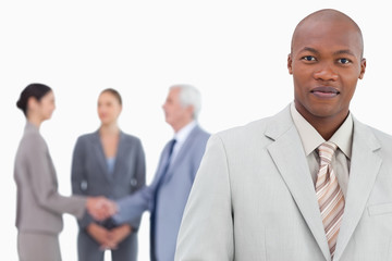 Poster - Businessman with trading partners behind him