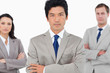 © WavebreakmediaMicro - Confident salesteam with arms folded