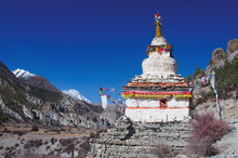 The Buddhist Stupa In The Background Of The Himalayas