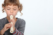 © auremar - Girl playing a recorder
