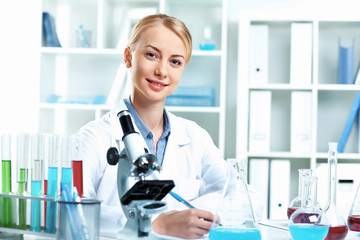 Wall Mural - Young scientist working in laboratory