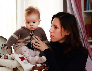 Wall Mural - mother and young daughter in home interior