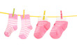 © Africa Studio - pink baby socks on rope isolated on white