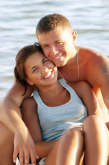 Closeup portrait of happy couple enjoying vacations