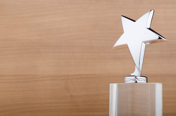 Wall Mural - star award against wooden background