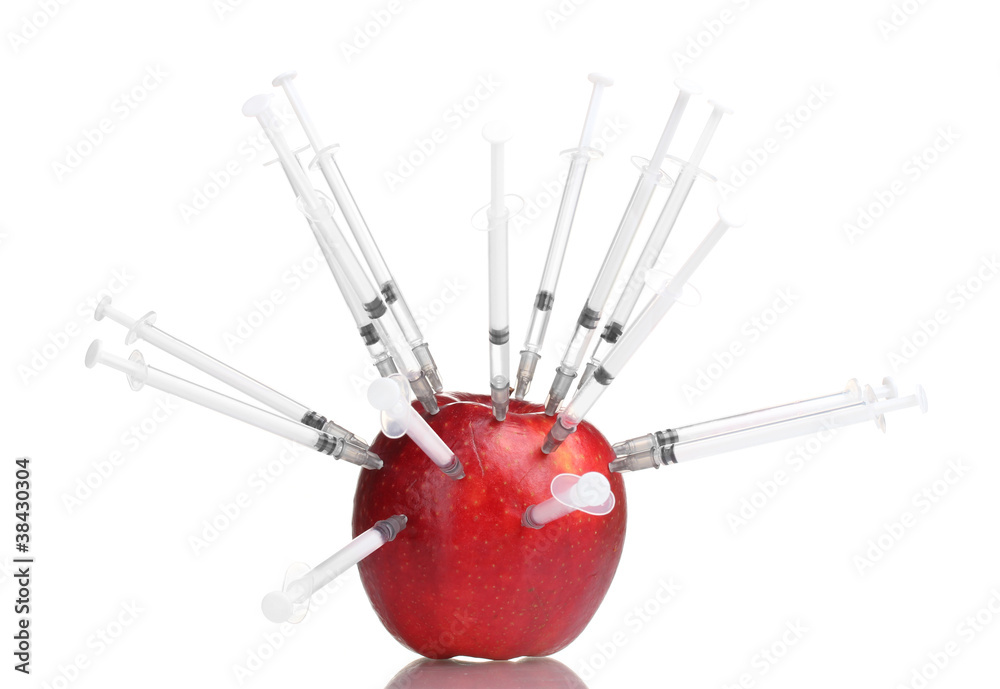 red apple and syringes isolated on white