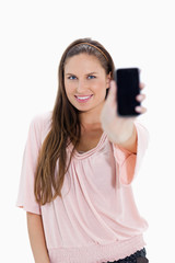 Poster - Close-up of a smiling girl showing a smartphone