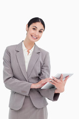 Poster - Smiling tradeswoman with her tablet computer