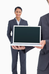 Poster - Close up of laptop being presented by salesteam