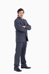 Poster - Young tradesman with arms folded