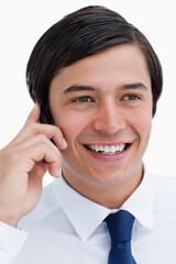 Poster - Close up of smiling tradesman on his cellphone