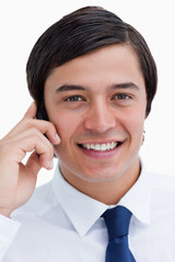 Poster - Close up of smiling tradesman on his mobile phone