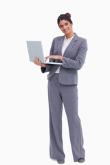 Poster - Smiling female entrepreneur with her laptop