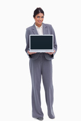 Poster - Smiling female entrepreneur presenting screen of her laptop