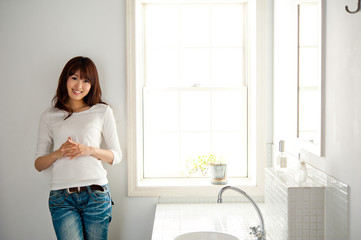 Wall Mural - attractive asian woman in the bathroom