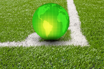 brazil globe on soccer field grass...world soccer 2014