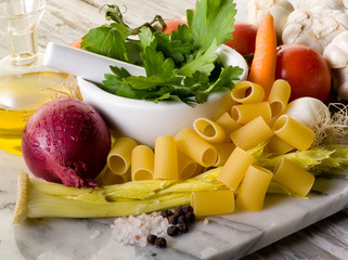 Poster - pasta with ingredients over marble