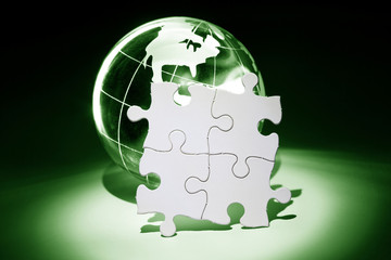 globe and white puzzle