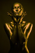 Nude woman like statue in liquid metal 