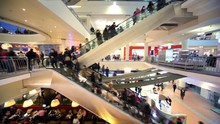 Many People Move On Escalators In Floors Shopping Center