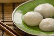 Dim sum dumplings on a green plate
