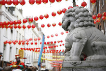 Chinese Lion Statue With Red Lanterns