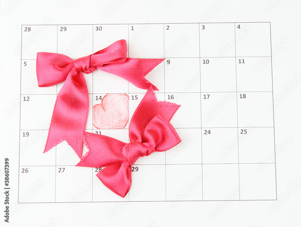 Calendar page with hearts and bows on St.Valentines Day
