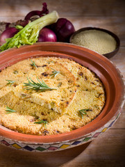 Canvas Print - couscous cake with onions