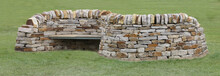 A Double Sided Bench Built Into A Dry Stone Wall.
