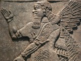 Fototapeta Londyn - Ancient Assyrian wall carving of a man