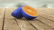 blue skin orange on wooden table
