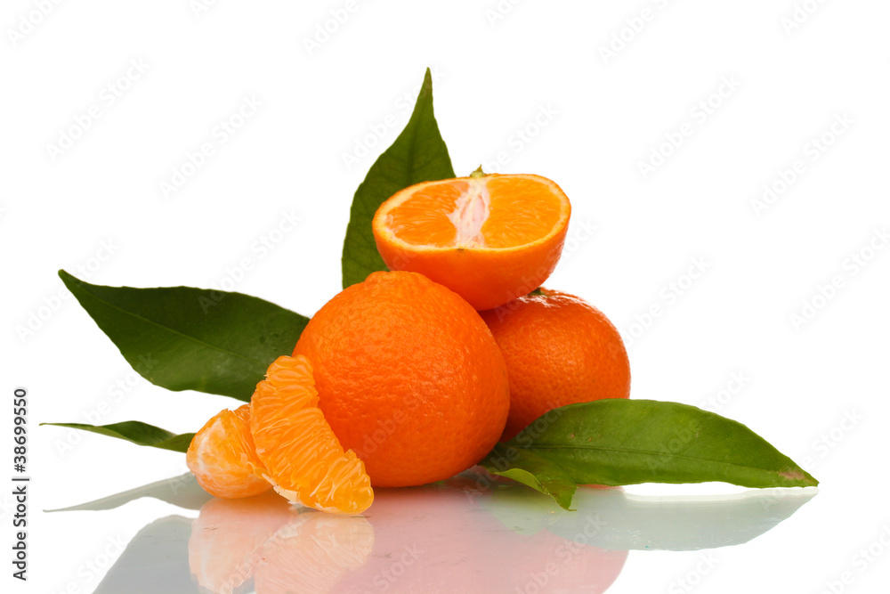 Ripe tasty tangerines with leaves and segments isolated on white