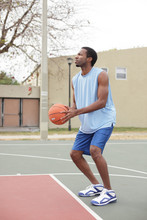 Basketball Player About To Toss The Ball