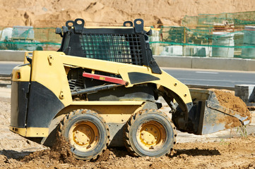 Poster - skid steer loader at earth moving works