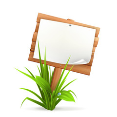 Canvas Print - Wooden sign in grass