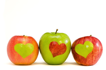 three apples with hearts